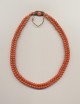Antique coral beads necklace for a child with gold clasp and safety chain, Germany, early 20th century, length inner row 14'' 36cm., outer row 14.75'' 37.5cm